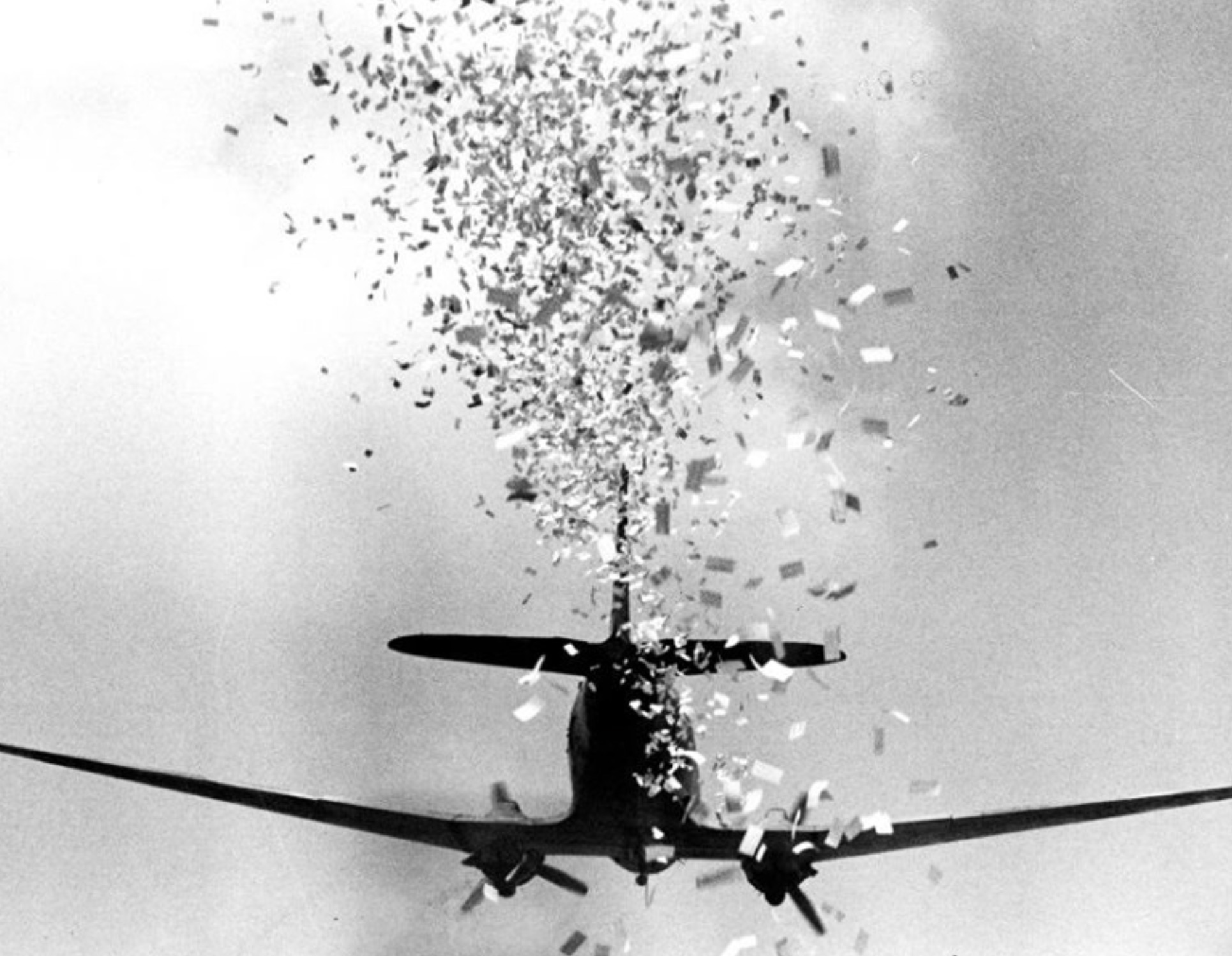 A plane dropping propaganda leaflets
